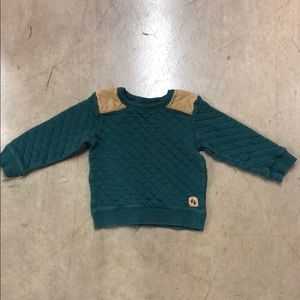 Green gold sweater